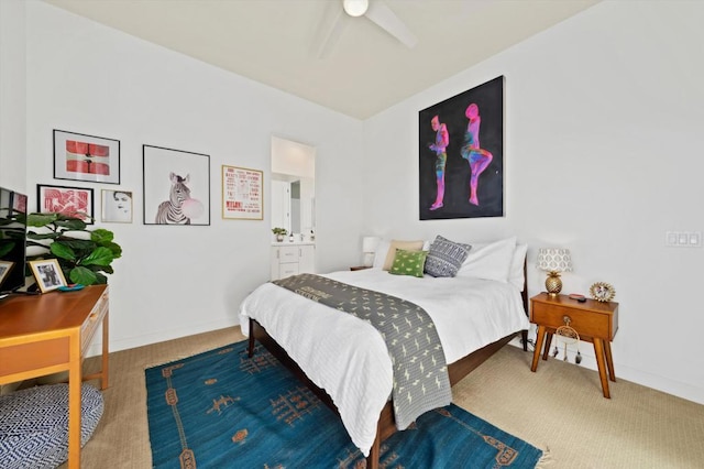 bedroom featuring ceiling fan and carpet