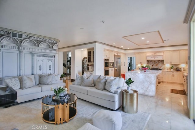 living room featuring crown molding