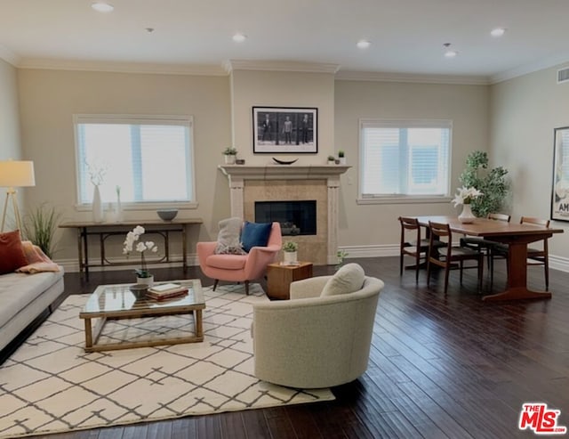 living room featuring hardwood / wood-style floors and ornamental molding