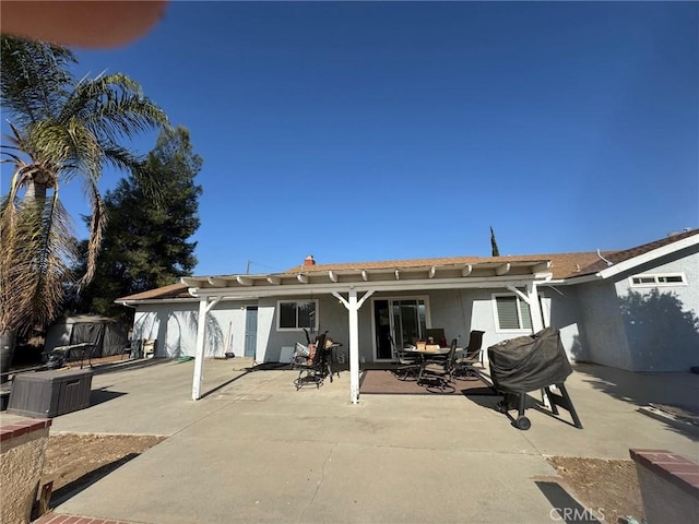 back of house featuring a patio