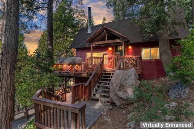 view of front of house with a wooden deck