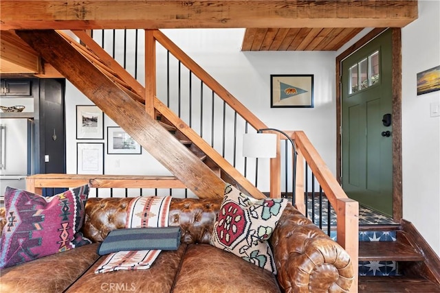 living room with beamed ceiling