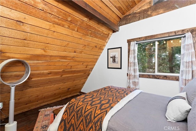 bedroom with dark hardwood / wood-style floors, wooden ceiling, and vaulted ceiling