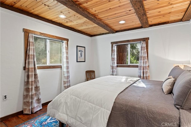 bedroom featuring beam ceiling, wood ceiling, and dark hardwood / wood-style floors