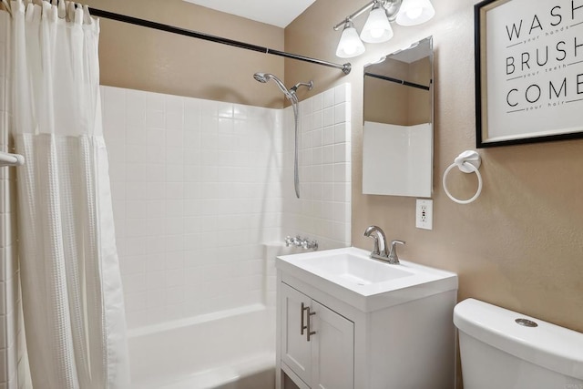 full bathroom with shower / tub combo with curtain, vanity, and toilet