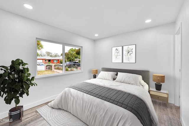 bedroom featuring hardwood / wood-style floors