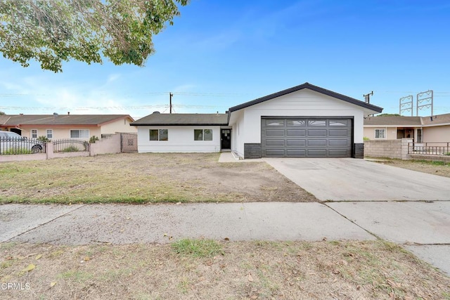 ranch-style home featuring a garage