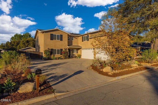 view of front of house with a garage