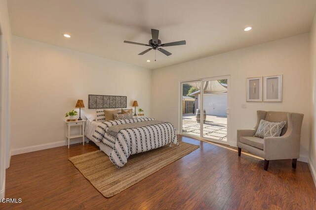 bedroom featuring access to exterior, ceiling fan, and dark wood-type flooring