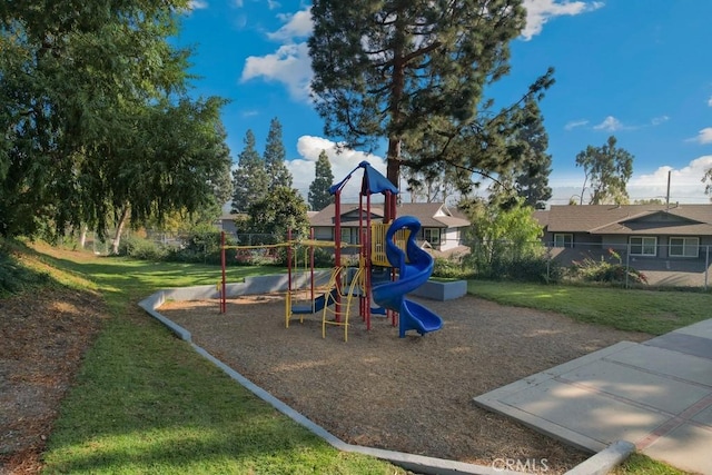 view of play area featuring a lawn