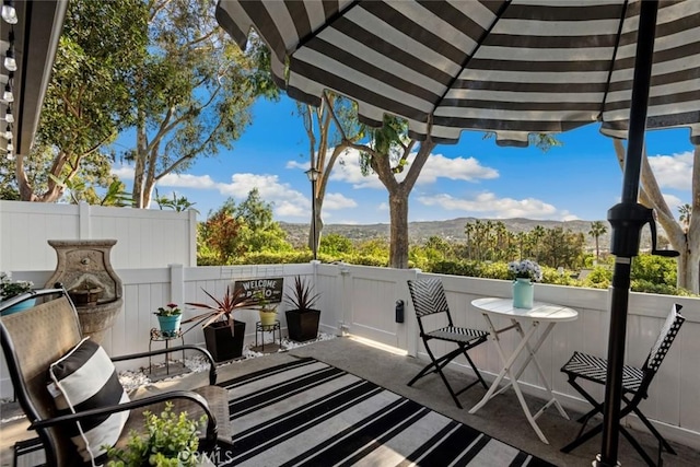 view of patio with a mountain view