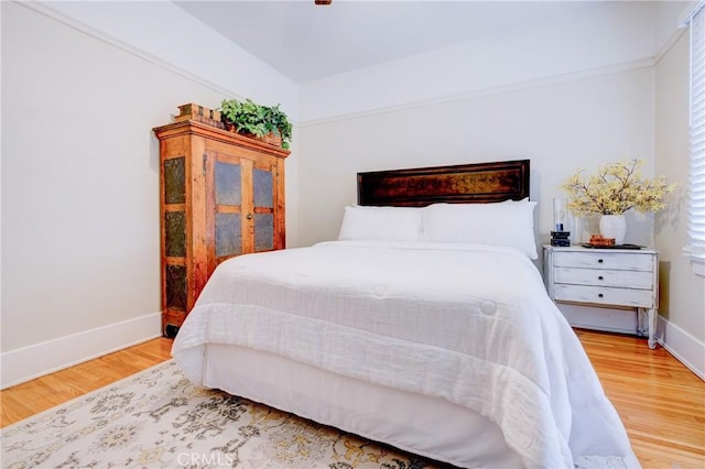 bedroom featuring hardwood / wood-style flooring