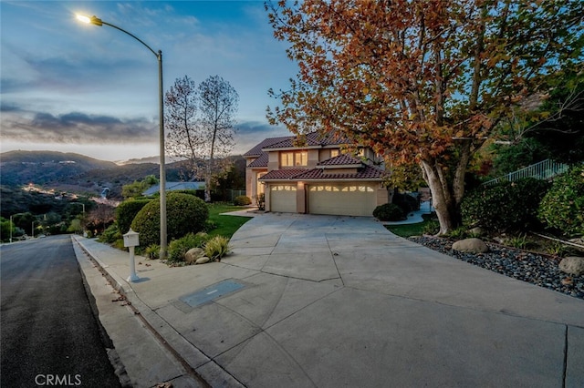 view of front of house featuring a mountain view