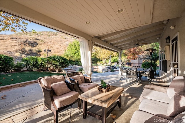 view of patio / terrace featuring outdoor lounge area and ceiling fan