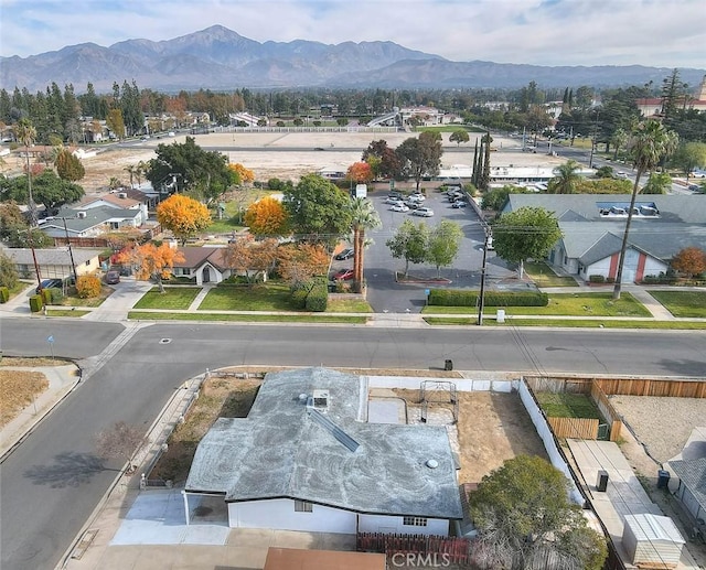 drone / aerial view featuring a mountain view