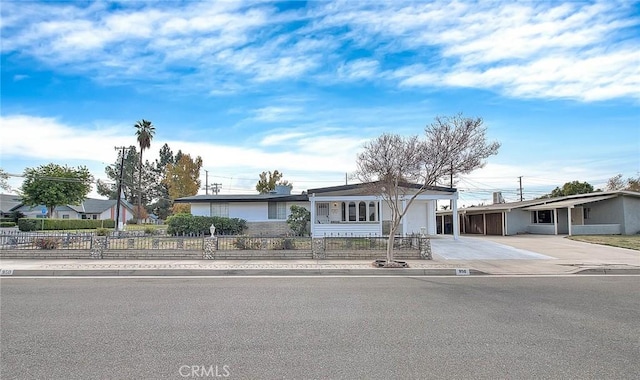 single story home featuring a garage