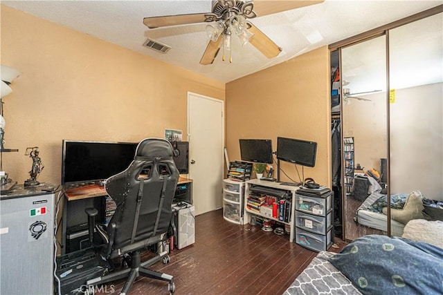 office featuring ceiling fan and dark hardwood / wood-style flooring