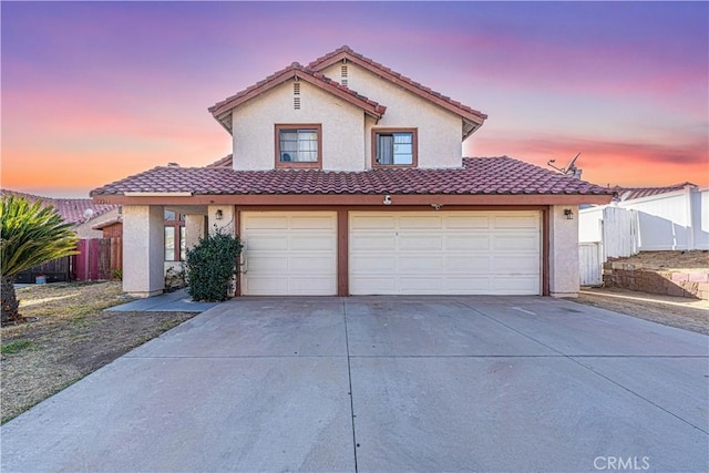 view of front of property featuring a garage