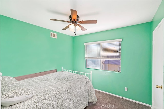 bedroom featuring ceiling fan and carpet flooring