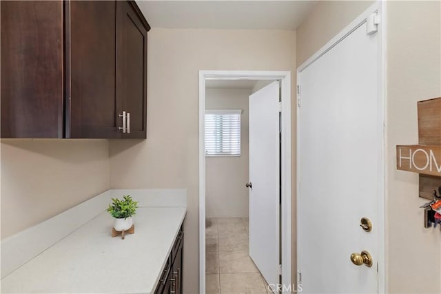 bathroom featuring tile patterned flooring and vanity