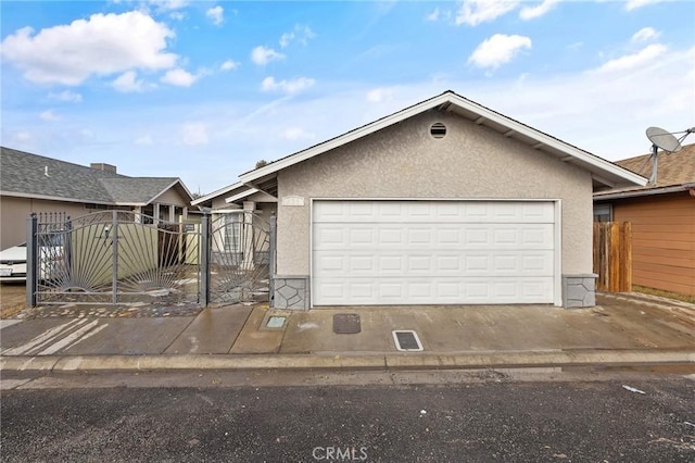 ranch-style home featuring a garage