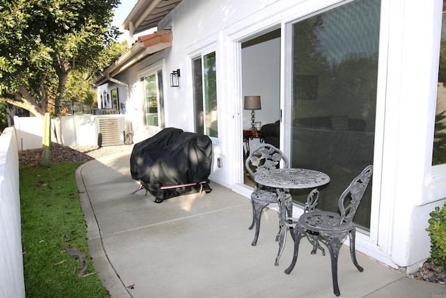 view of patio featuring a grill