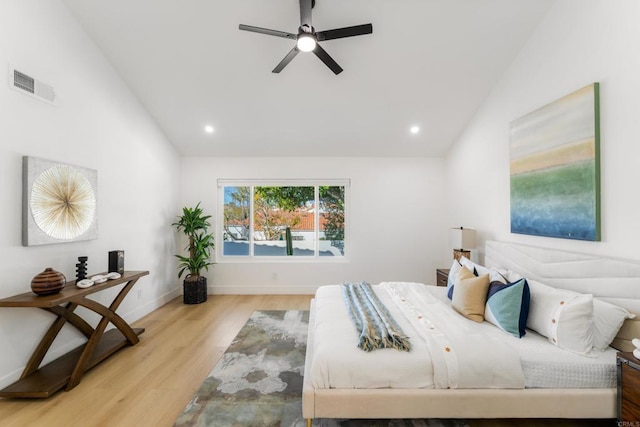 bedroom featuring baseboards, visible vents, wood finished floors, and recessed lighting