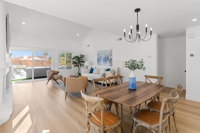 dining space with visible vents, baseboards, light wood-style flooring, a notable chandelier, and recessed lighting