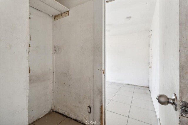 bathroom with tile patterned flooring