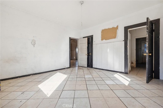 2853 E 6th St, Los Angeles, CA 90023 - spare room with light tile patterned floors