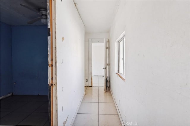 2853 E 6th St, Los Angeles, CA 90023 - hallway featuring light tile patterned flooring and baseboards