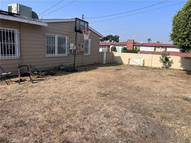 view of yard with central AC