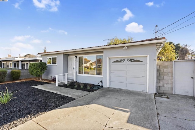 single story home featuring a garage