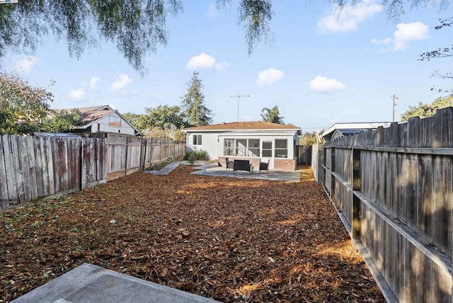 view of yard with a patio area