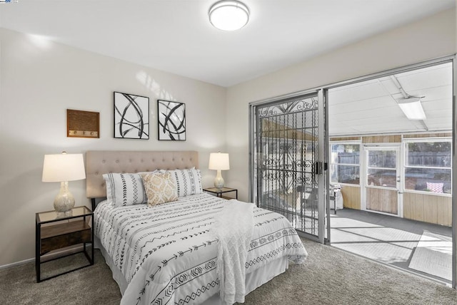 bedroom featuring carpet floors and access to outside