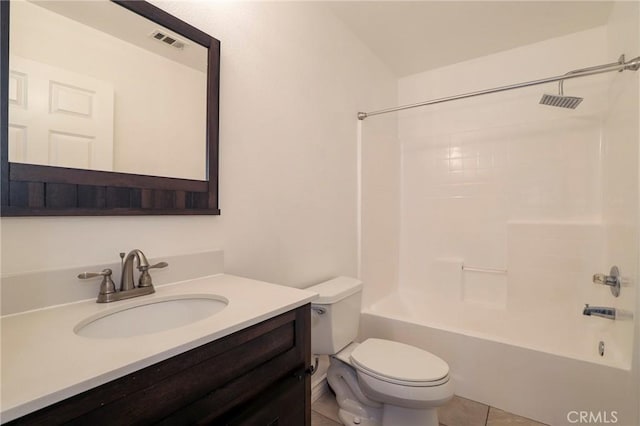 full bathroom featuring tile patterned floors, vanity, bathtub / shower combination, and toilet