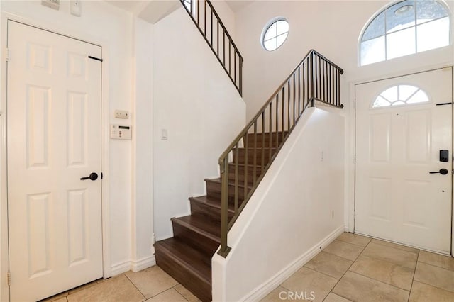 entryway featuring light tile patterned flooring