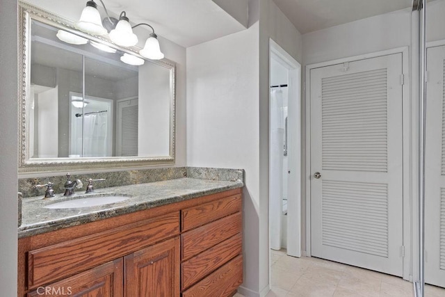 7340 Quill Dr Unit 81, Downey, CA 90242 - bathroom with vanity, tile patterned floors, and a shower with shower curtain