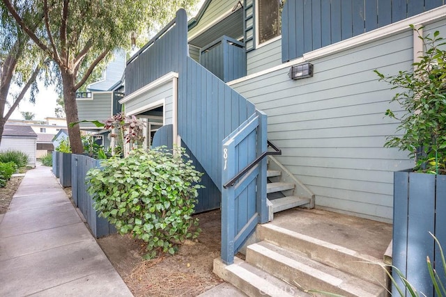 7340 Quill Dr Unit 81, Downey, CA 90242 - view of exterior entry with board and batten siding