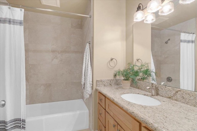 bathroom featuring vanity and shower / tub combo