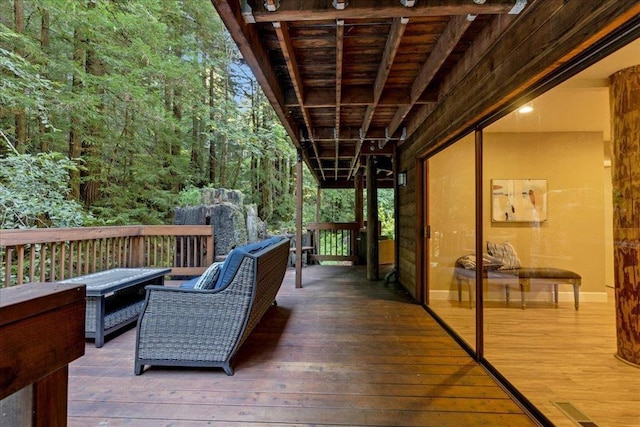 deck featuring an outdoor living space