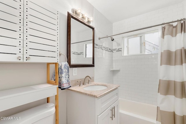 full bathroom featuring toilet, vanity, and shower / tub combo with curtain