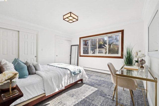 bedroom featuring crown molding and a baseboard heating unit