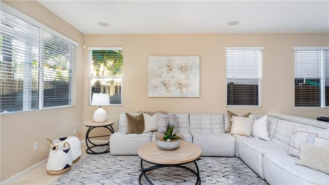 living room featuring light tile patterned floors