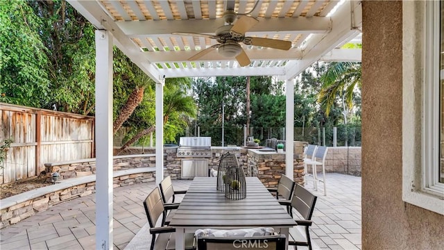 view of patio with a pergola, area for grilling, and ceiling fan