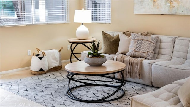 sitting room featuring tile patterned flooring