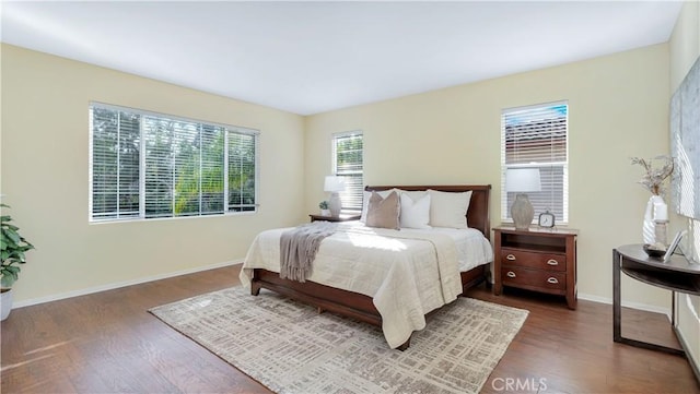 bedroom featuring dark hardwood / wood-style floors