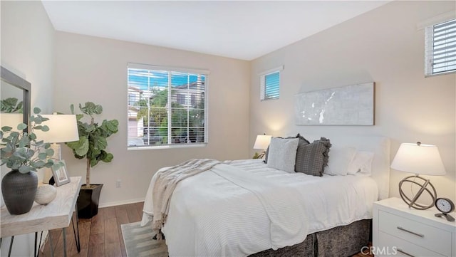 bedroom featuring dark hardwood / wood-style flooring