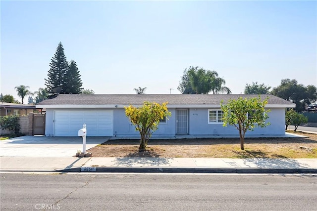 single story home featuring a garage