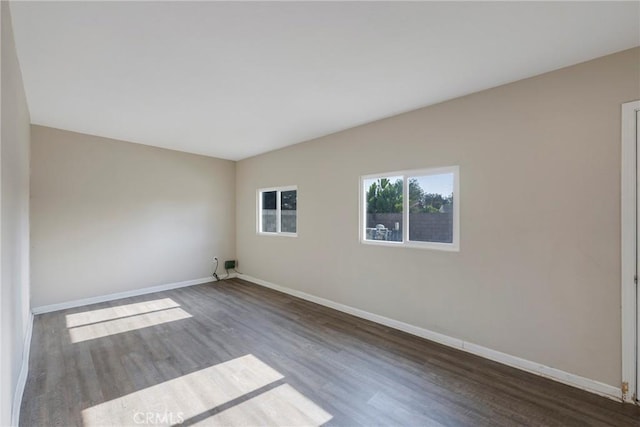 empty room featuring hardwood / wood-style floors